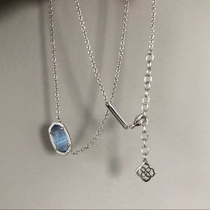 Light blue pendant on silver chain